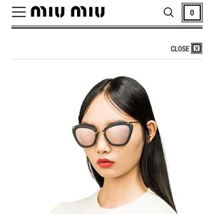 Retro-Inspired Miu Miu Noir Eyewear Sunglasses